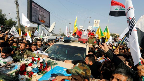Mourners attend the funeral of the Iranian Major-General Qassem Soleimani, head of the elite Quds Force of the Revolutionary Guards, and the Iraqi militia commander Abu Mahdi al-Muhandis - Sputnik International