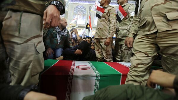 Mourners attend the funeral procession of the Iranian Major-General Qassem Soleimani, head of the elite Quds Force of the Revolutionary Guards, and the Iraqi militia commander Abu Mahdi al-Muhandis, who were killed in an air strike at Baghdad airport, in Kerbala, Iraq, January 4, 2020 - Sputnik International