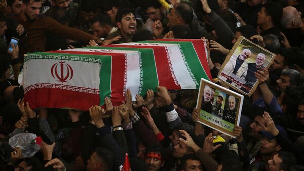 Mourners attend the funeral procession of the Iranian Major-General Qassem Soleimani, head of the elite Quds Force of the Revolutionary Guards, and the Iraqi militia commander Abu Mahdi al-Muhandis, who were killed in an air strike at Baghdad airport, in Kerbala, Iraq, January 4, 2020.  - Sputnik International