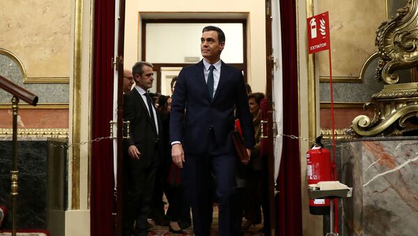 Spain's acting Prime Minister Pedro Sanchez arrives to attend the investiture debate at the Spanish Parliament in Madrid, Spain, 5 January 2020. REUTERS/Sergio Perez - Sputnik International