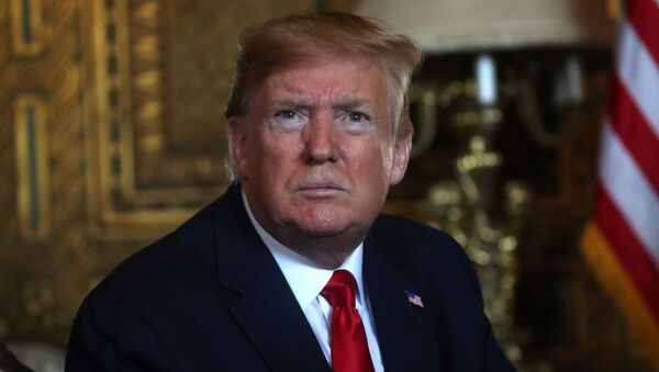 U.S. President Donald Trump speaks to the media after participating in a video teleconference with members of the U.S. military at Trump's Mar-a-Lago resort in Palm Beach, Florida, U.S., December 24, 2019. - Sputnik International