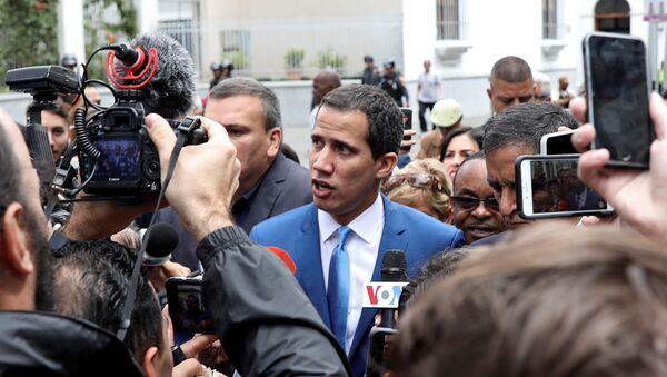 Venezuelan opposition leader Juan Guaido, who many nations have recognised as the country's rightful interim ruler, speaks to reporters outside Venezuela's National Assembly building in Caracas in Caracas, Venezuela January 5, 2020. - Sputnik International