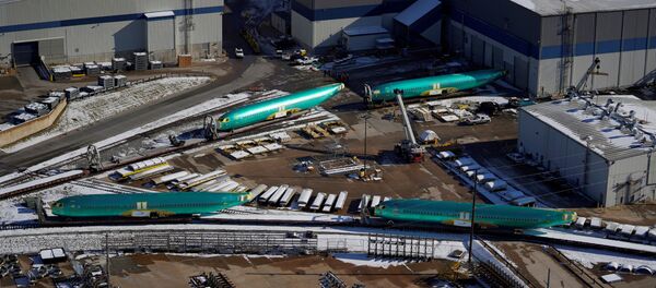 FILE PHOTO: Airplane fuselages bound for Boeing's 737 Max production facility await shipment on rail sidings at their top supplier, Spirit AeroSystems Holdings Inc, in Wichita, Kansas, U.S. December 17, 2019 FILE PHOTO: Airplane fuselages bound for Boeing's 737 Max production facility await shipment on rail sidings at their top supplier, Spirit AeroSystems Holdings Inc, in Wichita, Kansas, U.S. December 17, 2019 - Sputnik International
