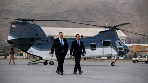 FILE - In this June 25, 2019 photo, Secretary of State Mike Pompeo, left, walks from a helicopter with U.S. Ambassador to Afghanistan John Bass. Bass is leaving Afghanistan, ending his two-year tenure as America's ambassador to the war-weary country that began in December 2017. - Sputnik International