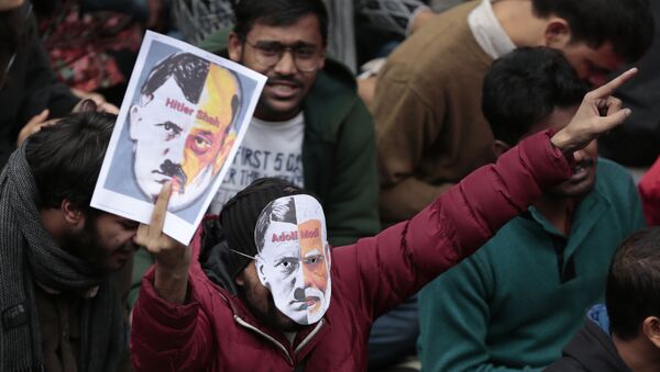 Students shout slogans inside the Jawaharlal Nehru University in New Delhi, India, Monday, Jan. 6, 2020. - Sputnik International