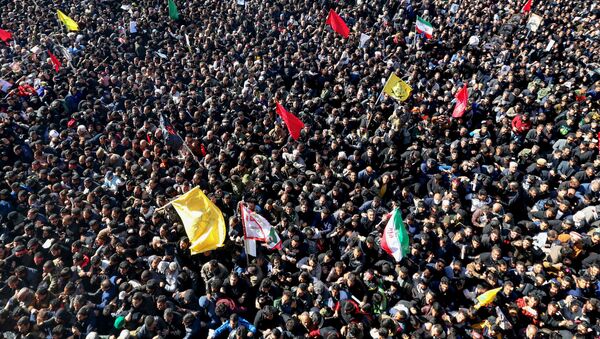 Iranian mourners gather during the final stage of funeral processions for slain top general Qasem Soleimani, in his hometown Kerman on January 7, 2020. - Sputnik International