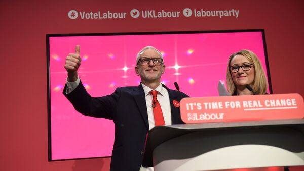 Britain's  Labour Party shadow Business Secretary Rebecca Long-Bailey (R) stands with Britain's opposition Labour Party leader Jeremy Corbyn during the launch of the Labour party election manifesto in Birmingham, northwest England on November 21, 2019. - Sputnik International