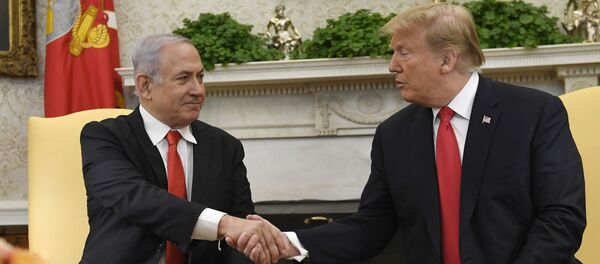 President Donald Trump, right, and Israeli Prime Minister Benjamin Netanyahu, left, shake hands in the Oval Office of the White House in Washington, Monday, March 25, 2019, at the beginning of their meeting.  - Sputnik International