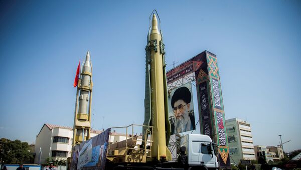 A display featuring missiles and a portrait of Iran's Supreme Leader Ayatollah Ali Khamenei is seen at Baharestan Square in Tehran, Iran  - Sputnik International