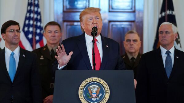 U.S. President Donald Trump delivers a statement about Iran flanked by U.S. Secretary of Defense Mark Esper, Vice President Mike Pence and military leaders in the Grand Foyer at the White House in Washington, U.S., January 8, 2020. - Sputnik International