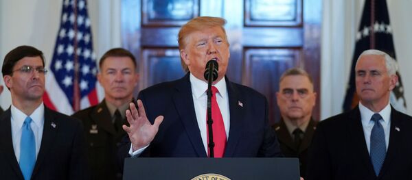 U.S. President Donald Trump delivers a statement about Iran flanked by U.S. Secretary of Defense Mark Esper, Vice President Mike Pence and military leaders in the Grand Foyer at the White House in Washington, U.S., January 8, 2020. - Sputnik International