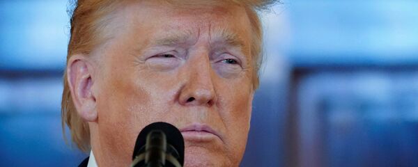 U.S. President Donald Trump pauses as he delivers a statement about Iran in the Grand Foyer at the White House in Washington, U.S., January 8, 2020 - Sputnik International