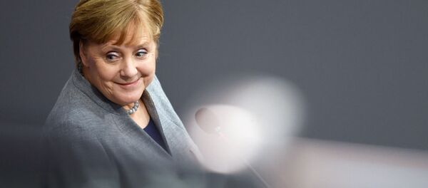 German Chancellor Angela Merkel attends a session of lower house of parliament, the Bundestag, in Berlin, Germany, December 18, 2019 - Sputnik International