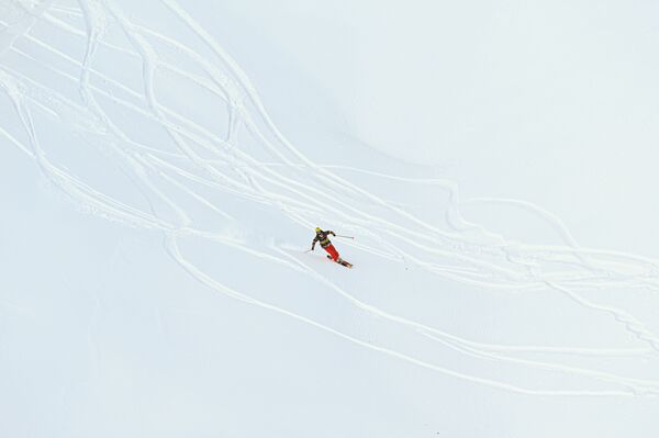 A person is skiing in the 'Gorky Gorod' resort in Russia's Sochi. - Sputnik International
