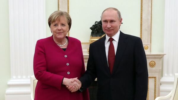 Russian President Putin meets with German Chancellor Merkel - Sputnik International