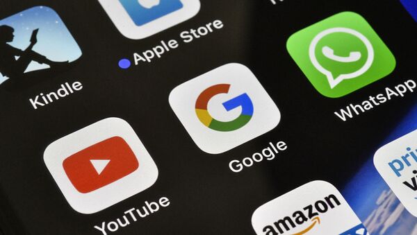 The icons of Google, WhatsApp and YouTube are pictured on an iPhone on Thursday, Nov. 15, 2018 in Gelsenkirchen, Germany - Sputnik International