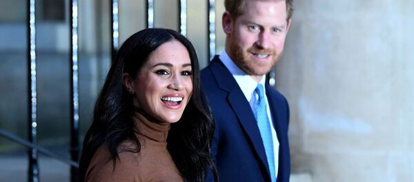  Britain's Prince Harry and his wife Meghan, Duchess of Sussex react as they leave after their visit to Canada House in London, Britain  January 7, 2020 - Sputnik International