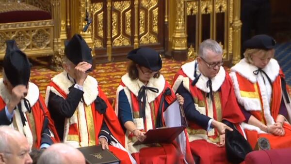A still image taken from footage broadcast by the UK Parliamentary Recording Unit (PRU) on December 17, 2019 shows members of the Royal Commission in the House of Lords in a ceremony that starts the new parliament following a general election in London. - Sputnik International