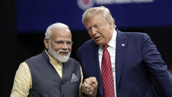 President Donald Trump shakes hands with Indian Prime Minister Narendra Modi during the Howdy Modi: Shared Dreams, Bright Futures event at NRG Stadium, Sunday, Sept. 22, 2019, in Houston - Sputnik International