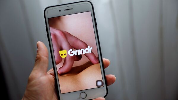 Grindr app is seen on a mobile phone in this photo illustration taken in Shanghai, China March 28, 2019.  - Sputnik International