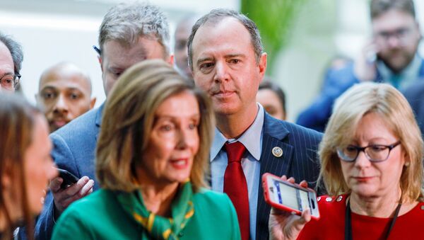 House Intelligence Committee Chairman Adam Schiff (D-CA) and House Speaker Nancy Pelosi (D-CA) are followed by reporters after a House Democratic Caucus meeting to discuss transmitting the articles of impeachment against U.S. President Donald Trump to the Senate at the U.S. Capitol in Washington, U.S., January 14, 2020 - Sputnik International