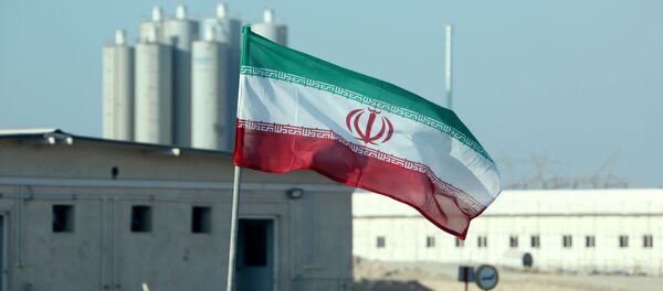 (FILES) In this file photo taken on November 10, 2019 an Iranian flag flutters in Iran's Bushehr nuclear power plant, during an official ceremony to kick-start works on a second reactor at the facility (FILES) In this file photo taken on November 10, 2019 an Iranian flag flutters in Iran's Bushehr nuclear power plant, during an official ceremony to kick-start works on a second reactor at the facility - Sputnik International
