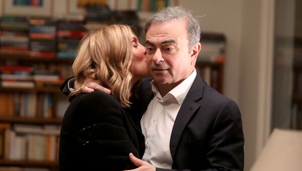 Former Nissan chairman Carlos Ghosn and his wife Carole Ghosn pose for a picture after an exclusive interview with Reuters in Beirut, Lebanon January 14, 2020 - Sputnik International