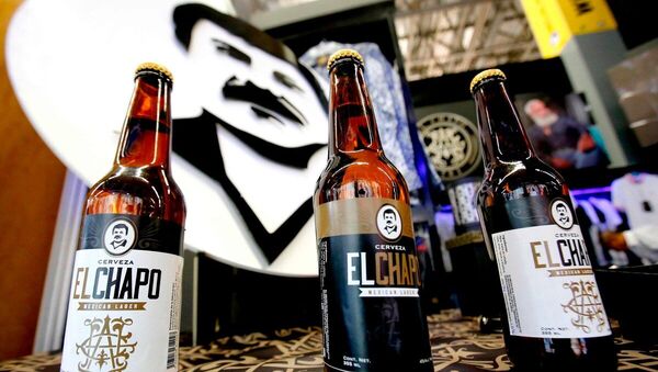 Bottles of beer of El Chapo 701, a line in clothing, jewelry and liquor bearing the nickname of the jailed Mexican drug lord Joaquin El Chapo Guzman Loera, are displayed during the 72 edition of IM Intermoda Mexico fashion fair in Guadalajara, Mexico, on January 14, 2020 - Sputnik International
