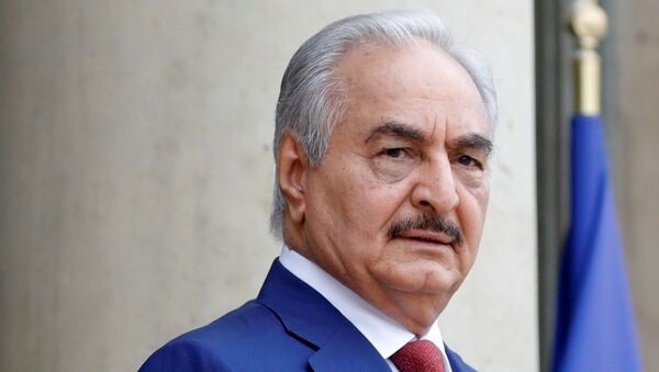 FILE PHOTO: Khalifa Haftar, the military commander who dominates eastern Libya, arrives to attend an international conference on Libya at the Elysee Palace in Paris, France, May 29, 2018 - Sputnik International
