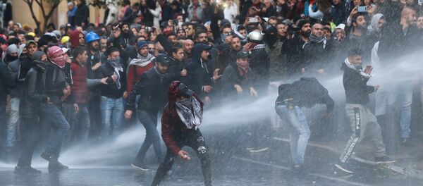 Demonstrators Hit by Water Canon During Protests in Beirut Demonstrators Hit by Water Canon During Protests in Beirut - Sputnik International