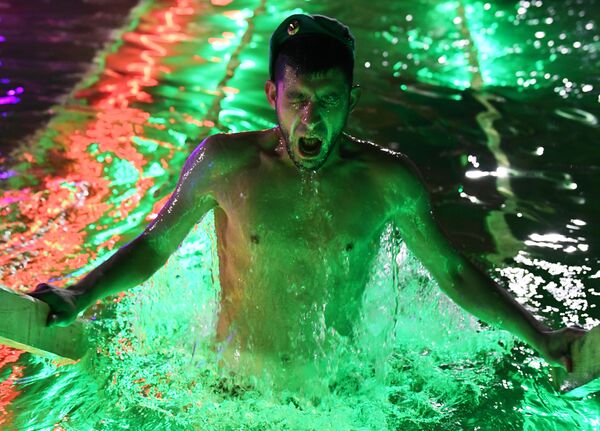 Russians Celebrate Epiphany by Bathing in Icy Waters - Photos Russians Celebrate Epiphany by Bathing in Icy Waters - Photos - Sputnik International