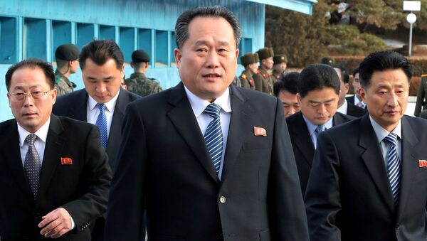 North Korean delegation led by Ri Son Gwon, Chairman of the Committee for the Peaceful Reunification of the Country (CPRC) of DPRK, crosses the concrete border to attend their meeting at the truce village of Panmunjom in the demilitarised zone separating the two Koreas, South Korea, January 9, 2018.  - Sputnik International