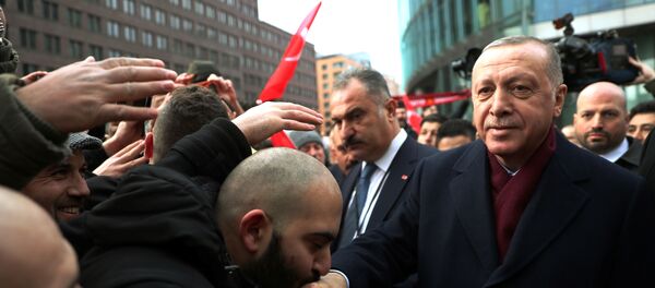 Turkish President Tayyip Erdogan is greeted by his supporters as he arrives for the Libya summit in Berlin, Germany, January 19, 2020. Turkish President Tayyip Erdogan is greeted by his supporters as he arrives for the Libya summit in Berlin, Germany, January 19, 2020. - Sputnik International