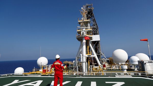 A Turkish Petroleum (TPAO) engineer poses on the helipad of Turkish drilling vessel Yavuz in the eastern Mediterranean Sea off Cyprus, August 6, 2019 - Sputnik International