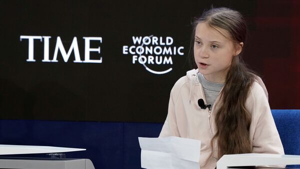 Swedish climate change activist Greta Thunberg attends a session at the 50th World Economic Forum (WEF) annual meeting in Davos, Switzerland, January 21, 2020 - Sputnik International