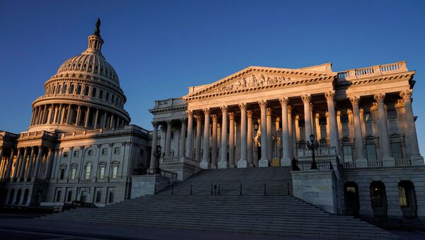 The sun rises on the US Capitol and Senate building as the impeachment trial of US President Donald Trump continues in Washington, US, January 22, 2020.  - Sputnik International