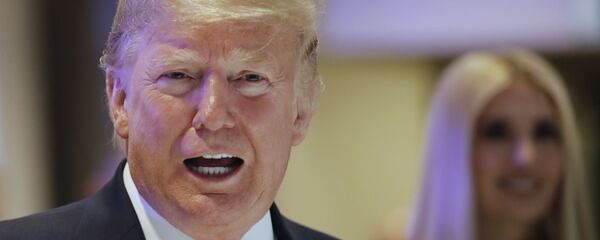 U.S. President Donald Trump and Ivanka Trump, right, arrive at the World Economic Forum in Davos, Switzerland, Wednesday, Jan. 22, 2020. The 50th annual meeting of the forum is taking place in Davos from Jan. 21 until Jan. 24, 2020.  - Sputnik International