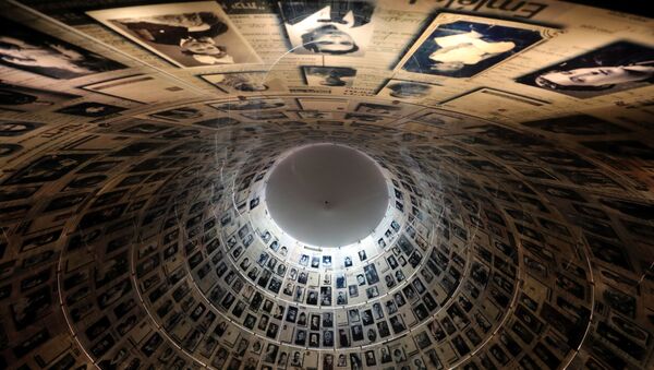 A view from below shows pictures of Jews killed in the Holocaust displayed at the Hall of Names in the Holocaust History Museum at the Yad Vashem World Holocaust Remembrance Centre in Jerusalem, 15 January 2020 - Sputnik International