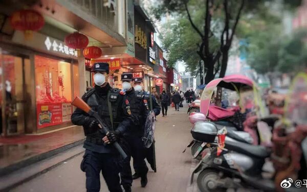 Police officers wear face masks amid the coronavirus outbreak in China - Sputnik International
