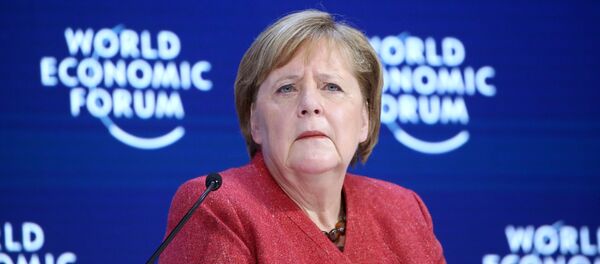 German Chancellor Angela Merkel arrives to deliver a special address at the 50th World Economic Forum (WEF) annual meeting in Davos, Switzerland, January 23, 2020 - Sputnik International