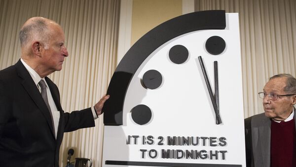 Former California Gov. Jerry Brown, left, and former Secretary of Defense William Perry unveil the Doomsday Clock during The Bulletin of the Atomic Scientists news conference in Washington, Thursday, Jan. 24, 2019. - Sputnik International