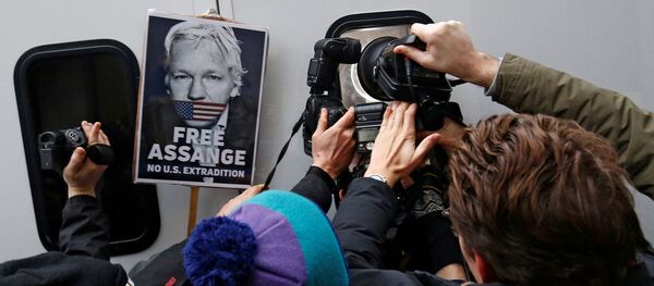 Photographers take pictures of WikiLeaks' founder Julian Assange as he leaves Westminster Magistrates Court in London, Britain January 13, 2020 Photographers take pictures of WikiLeaks' founder Julian Assange as he leaves Westminster Magistrates Court in London, Britain January 13, 2020 - Sputnik International