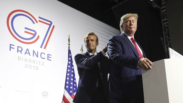 President Donald Trump and French President Emmanuel Macron wrap up a joint press conference at the G-7 summit in Biarritz, France, 26 August 2019 - Sputnik International