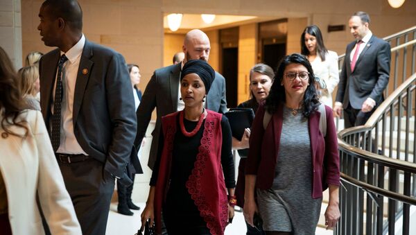 U.S. Representative Ilhan Omar (D-MN) and U.S. Representative Rashida Tlaib (D-MI)  arrive for a briefing on developments with Iran after attacks by Iran on U.S. forces in Iraq, at the U.S. Capitol in Washington, U.S., January 8, 2020 - Sputnik International