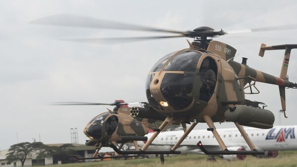 Two MD-530F Cayuse Warrior Helicopters prepare to takeoff during a Helicopter Handover Ceremony at Embakasi Barracks, Kenya, Jan. 23, 2020. The ceremony (During the ceremony, six MD-530F Cayuse Warrior helicopters were delivered to the KDF in a symbolic handover. Six more MD-530F helicopters will be delivered to the KDF in the near future. - Sputnik International
