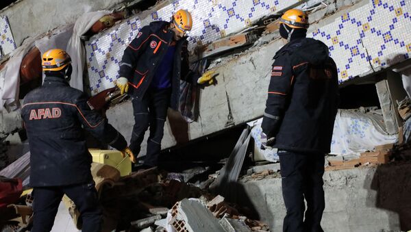 Emergency teams working at the site of the earthquake in Turkey - Sputnik International