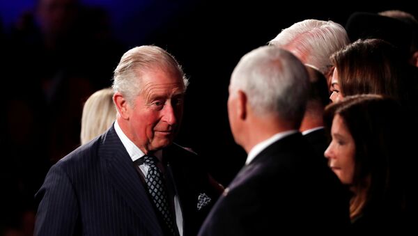 Britain's Prince Charles speaks to U.S. Vice President Mike Pence during the World Holocaust Forum - Sputnik International