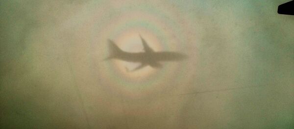  Plane shadow - Sputnik International