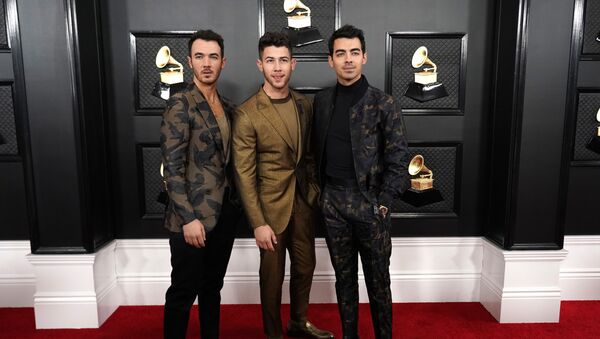 62nd Grammy Awards - Arrivals - Los Angeles, California, U.S., January 26, 2020 - (L-R) Kevin Jonas, NIck Jonas and Joe Jonas - Sputnik International