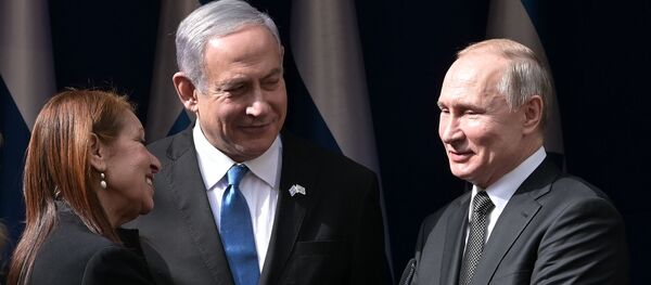 Russian President Vladimir Putin and Israeli Prime Minister Benjamin Netanyahu after meeting in Jerusalem with the mother of an Israeli woman who was convicted in Russia. Russian President Vladimir Putin and Israeli Prime Minister Benjamin Netanyahu after meeting in Jerusalem with the mother of an Israeli woman who was convicted in Russia. - Sputnik International